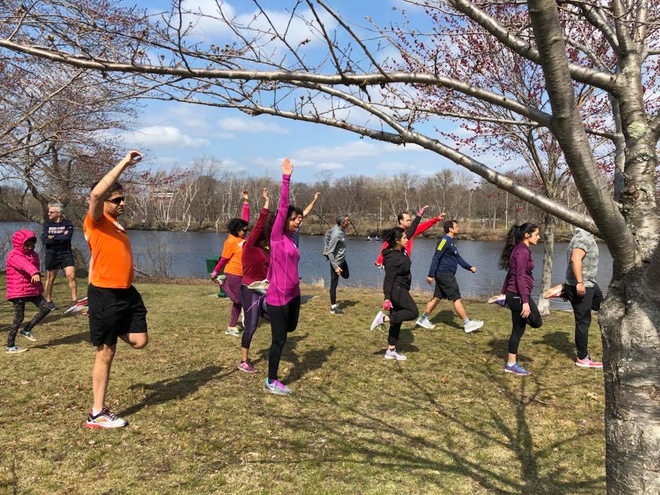 Coach waving during training run